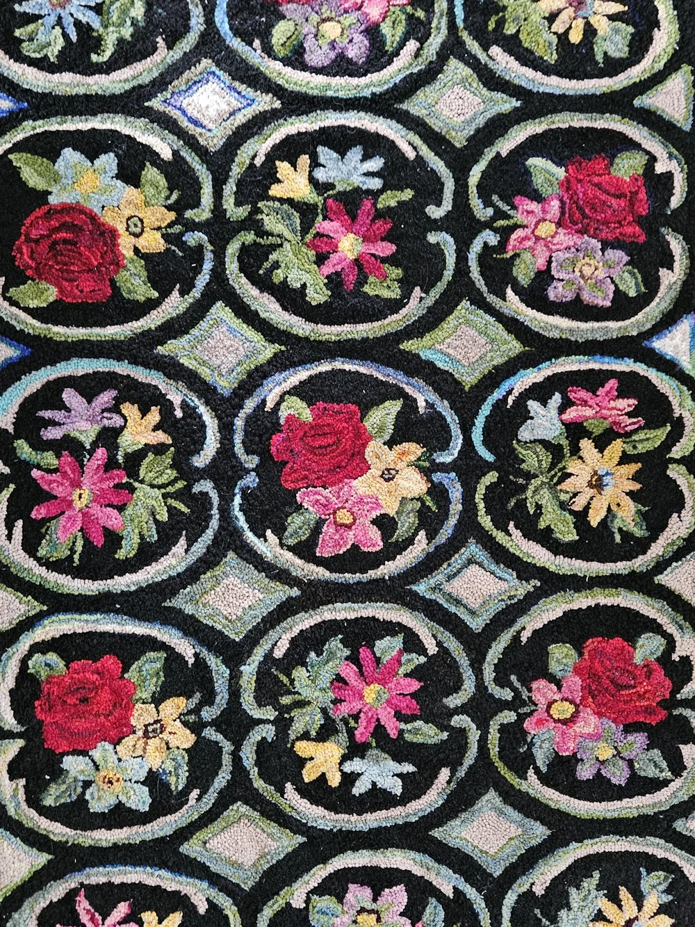 Hand-hooked Floral Rug in Black with Multicolor Flowers